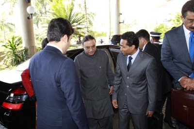 Pakistani President Asif Ali Zardari is welcomed by Saman Sarathchandra 